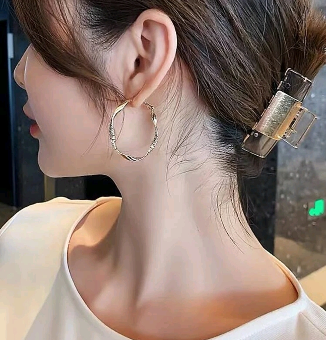 Gold Hoop twisted earrings - photo 2