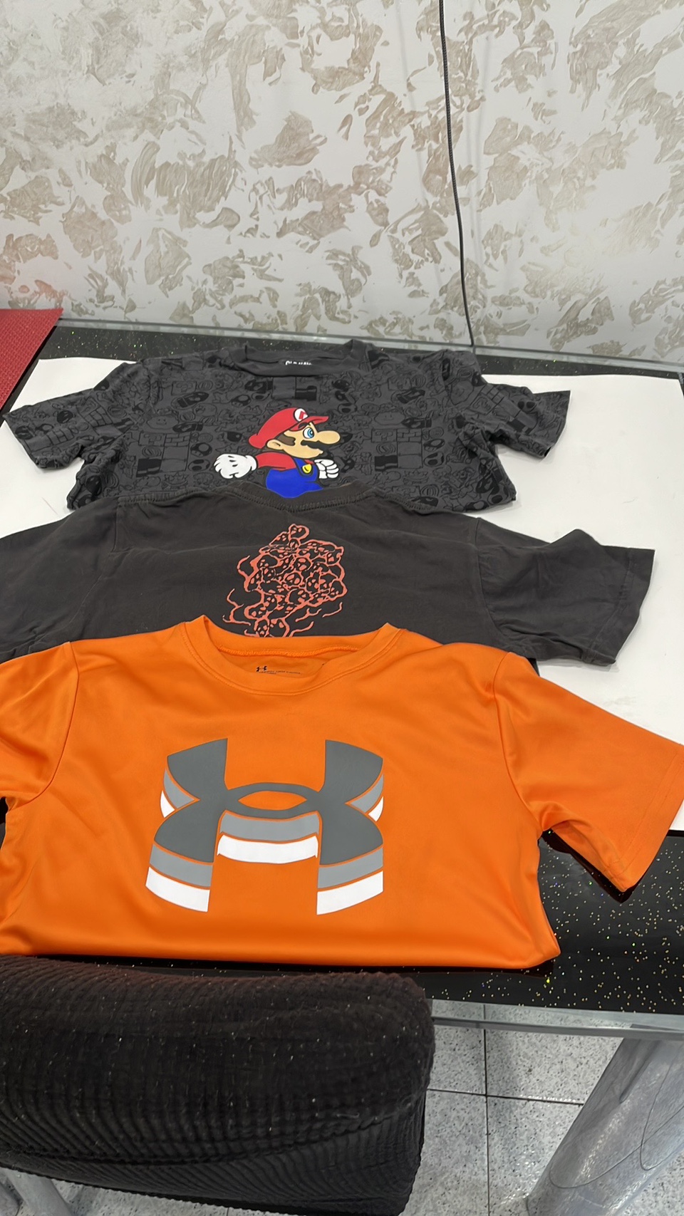 3 t-shirts. 10-12 and 7 years old. See pictures.#freecycle