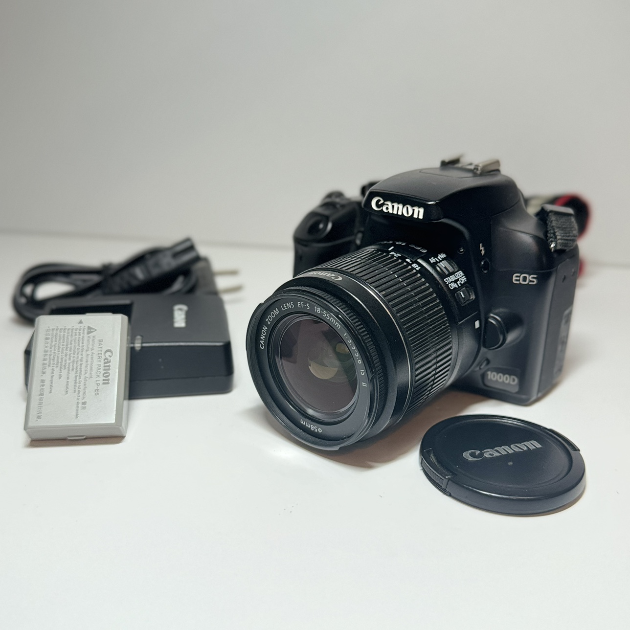 Canon EOS 1000D DSLR Camera with 18 55 mm Lens