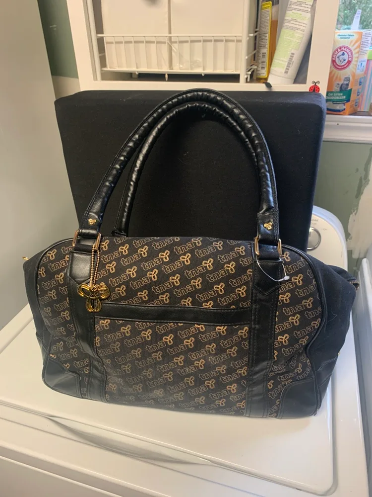 tna Black and Gold Weekender Bag image indicator(2)