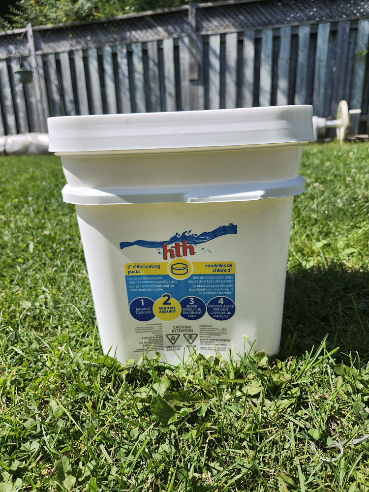 New sealed bucket of chlorinating pucks.