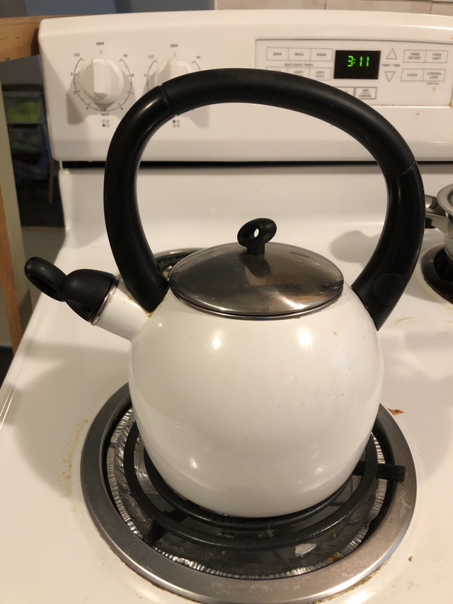 Whistling Kettle. White Enamel Kettle