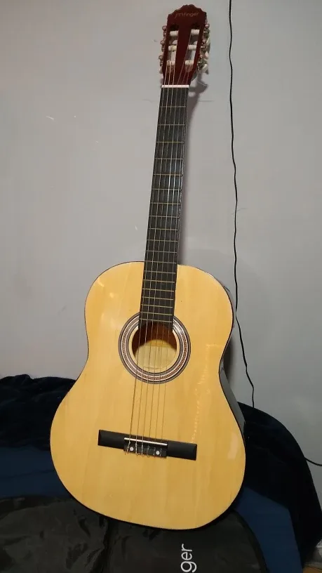 jmFinger Acoustic Guitar with Bag thumbnail