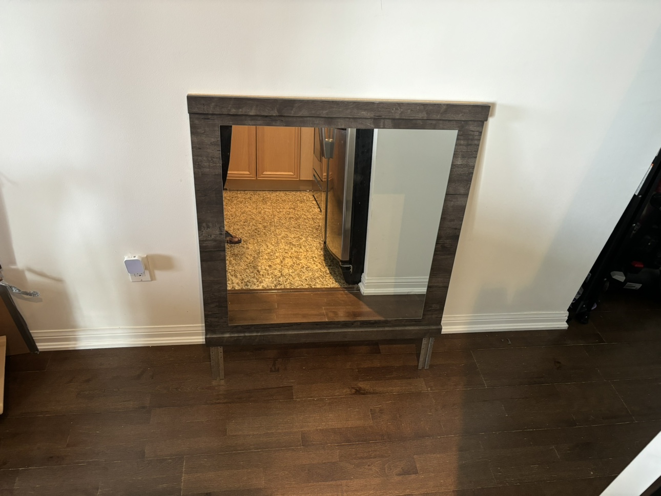 Mirror with dark wood frame