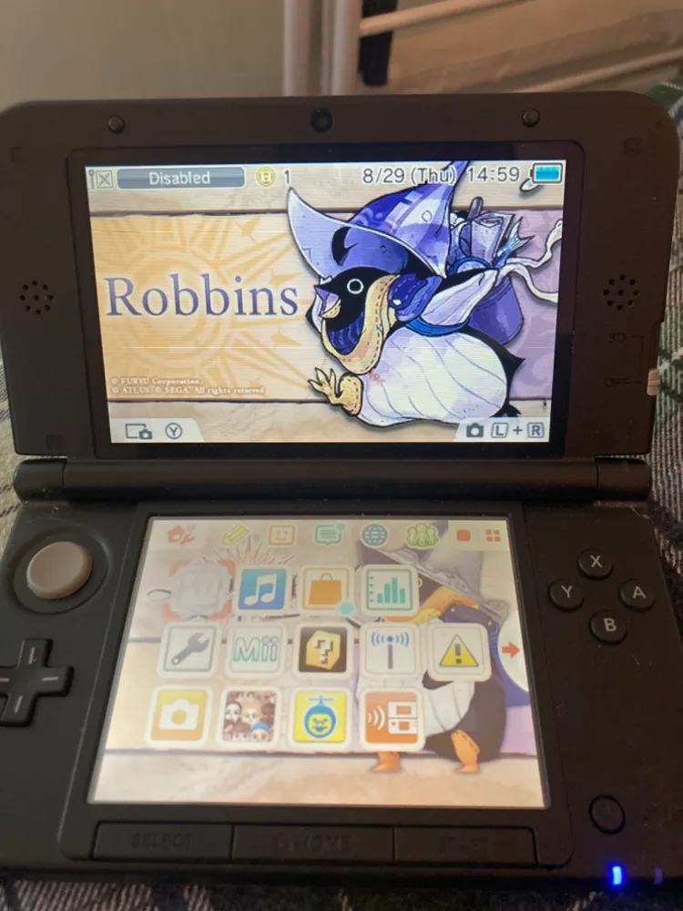Nintendo 3DS XL Black with games thumbnail