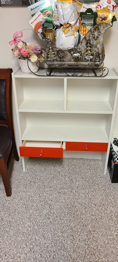 White Shelf Unit with Red Drawers