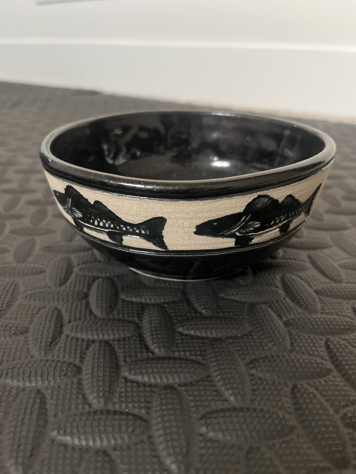 Black Pottery Bowl with Fish Design