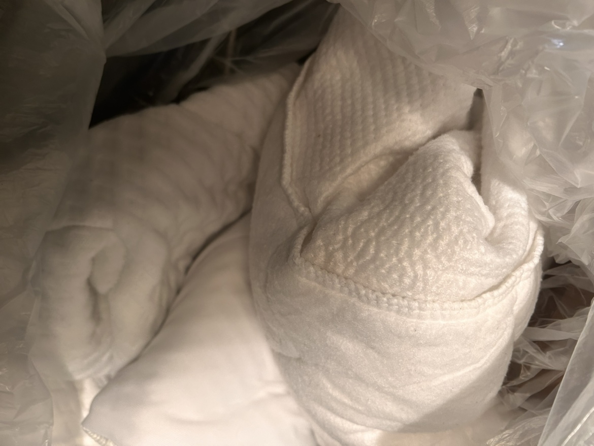 Four queen size mattress protectors (priced individually)