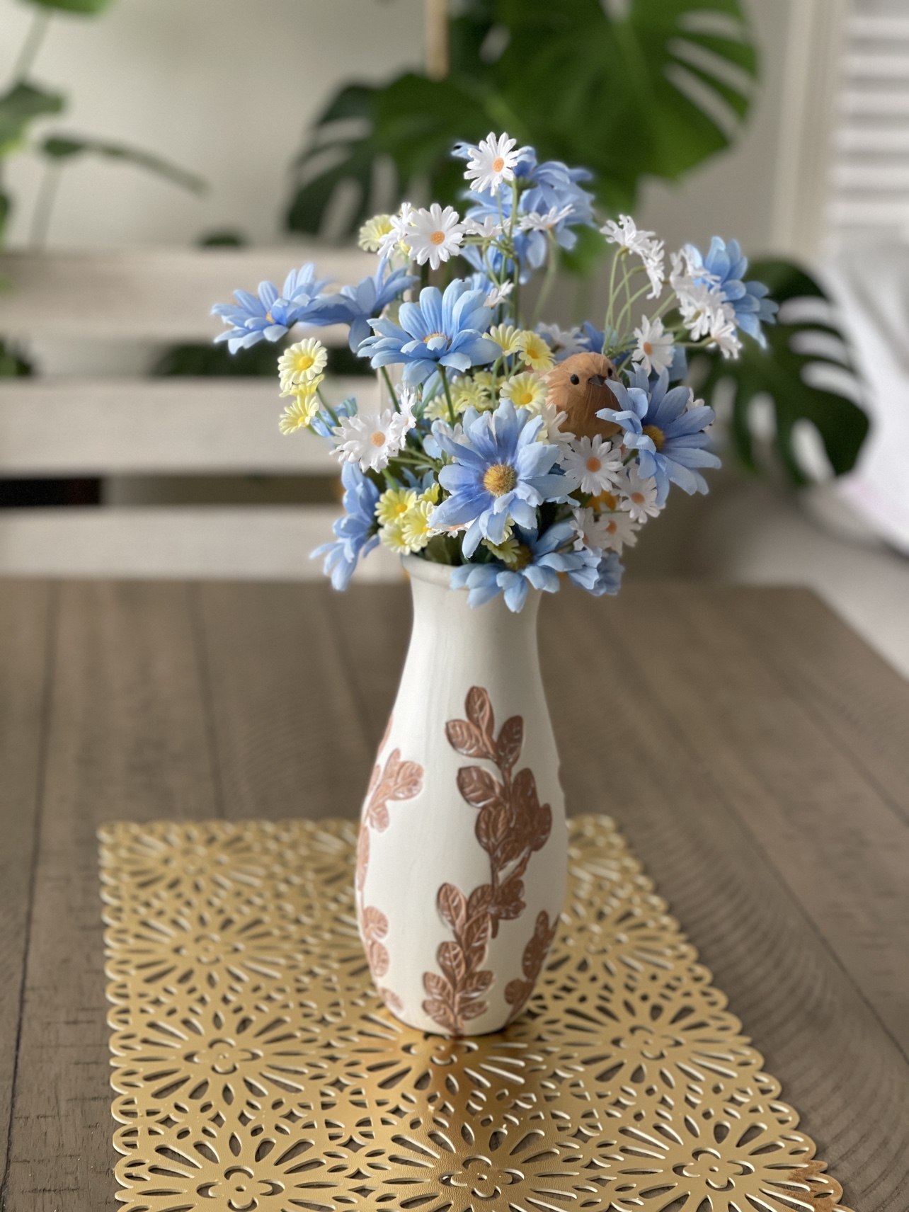 White Ceramic Vase with artificial flowers