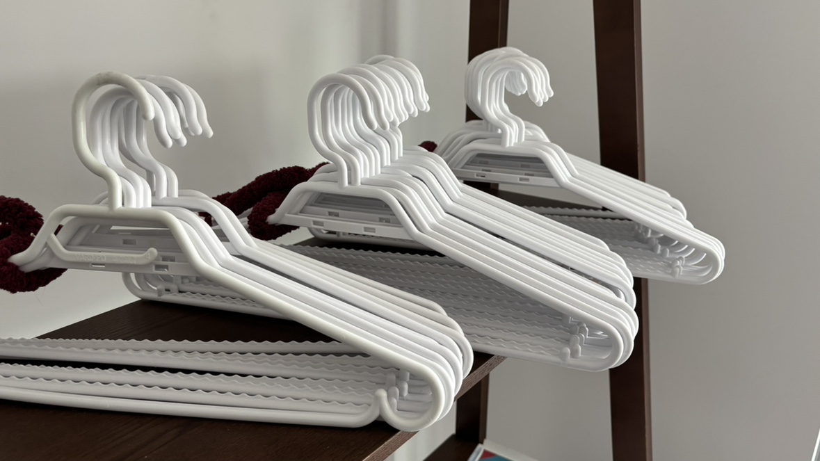 White Plastic Hangers and Clear Storage Containers - photo 2