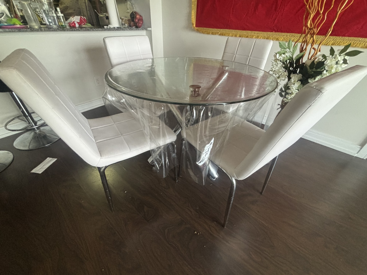 dining Glass Table and 4 Chairs with big flower vase