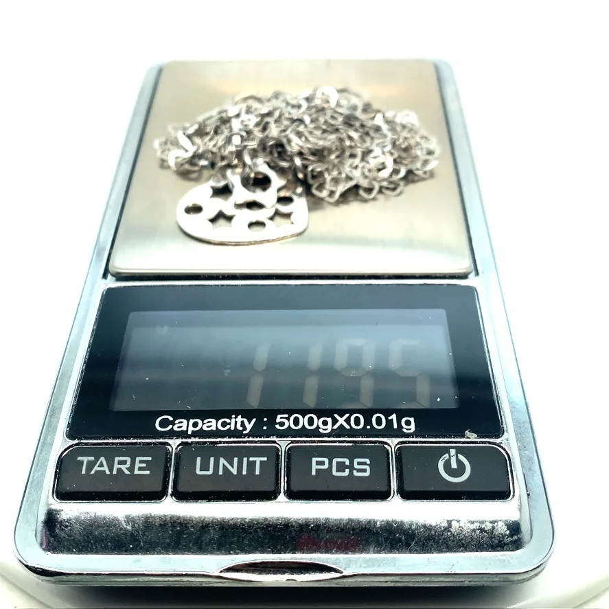 4-strand Sterling silver necklace with 9 charms image indicator(9)