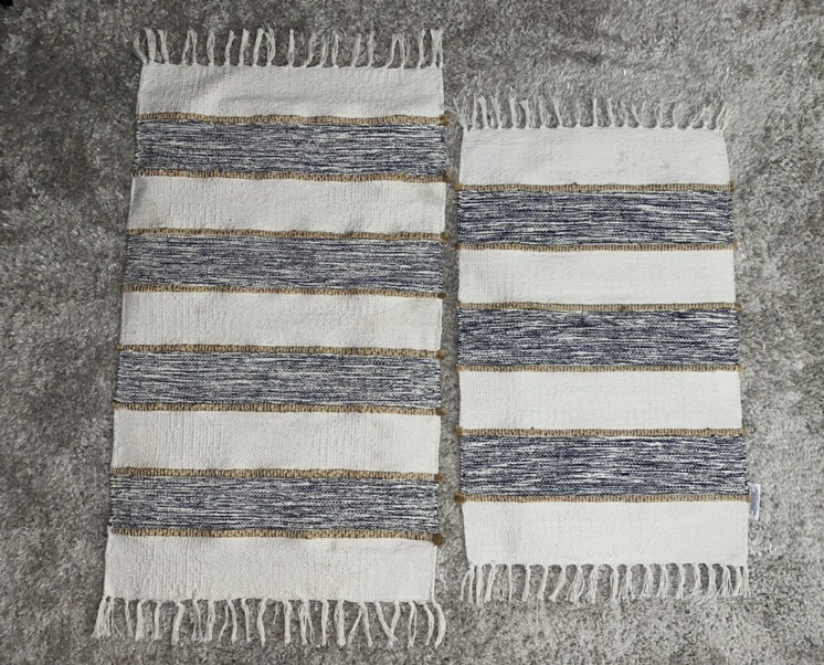Set of two hand crafted woven rugs