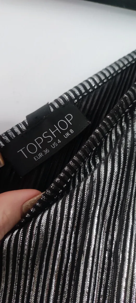 Silver and Black jumpsuit with shorts image indicator(4)