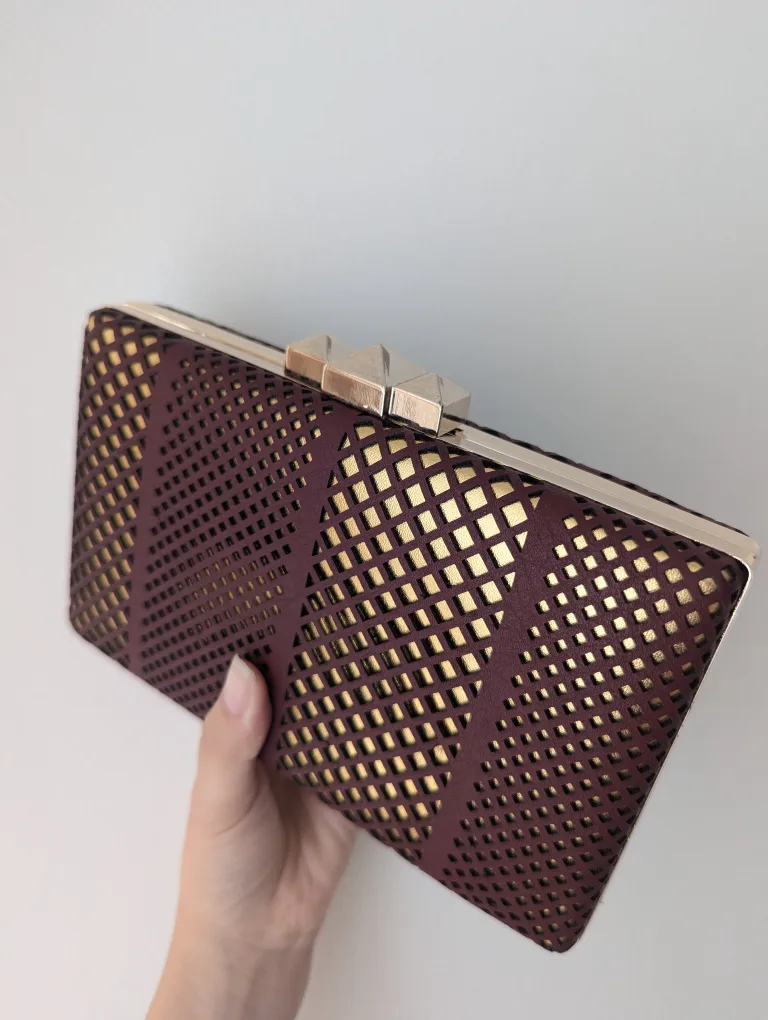 Gold and burgundy evening clutch with chain image indicator(2)