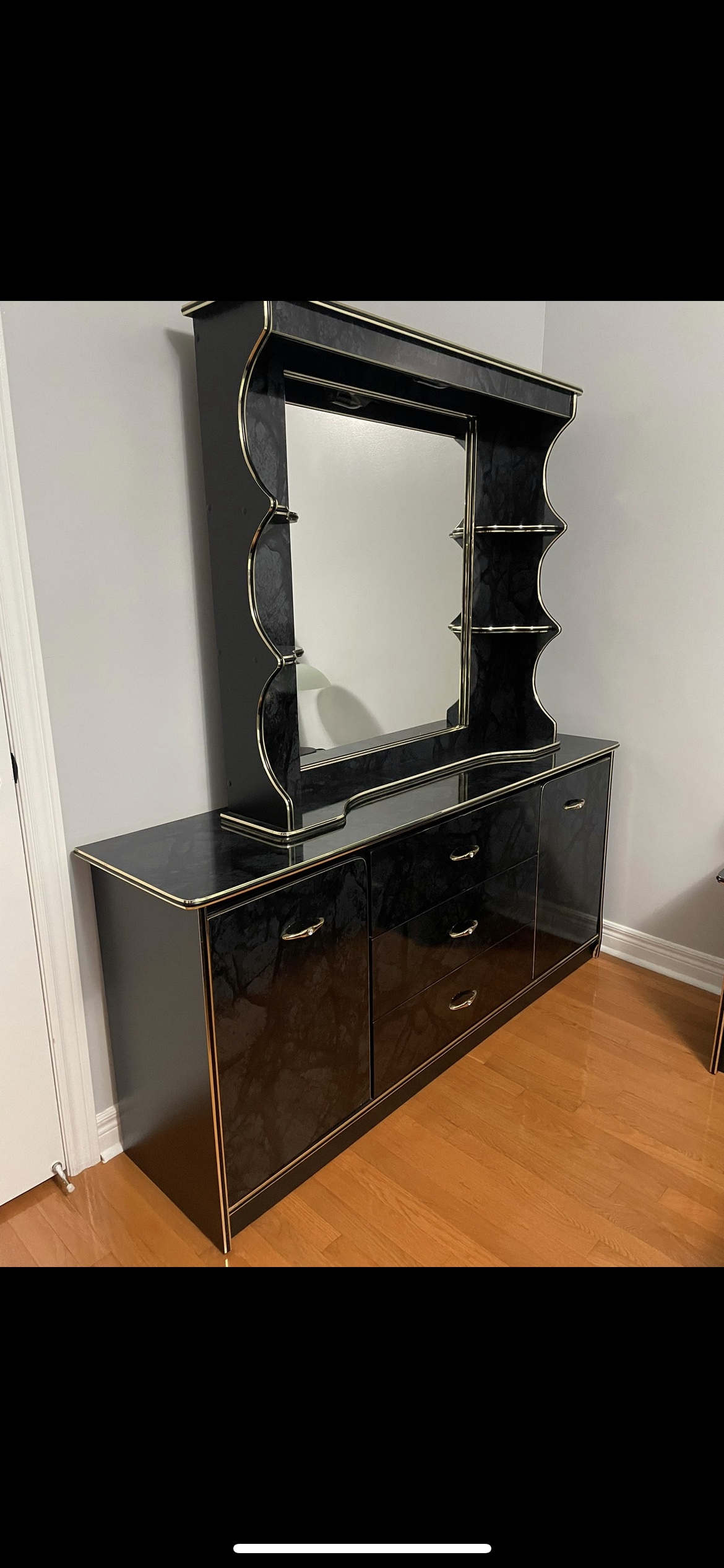 Black Vanity with golden trim and Mirror