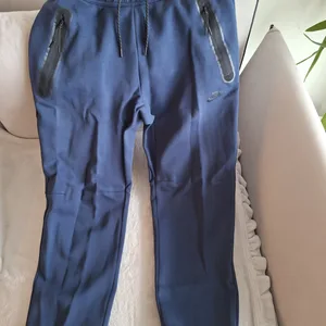 Nike track pants with zipper hotsell