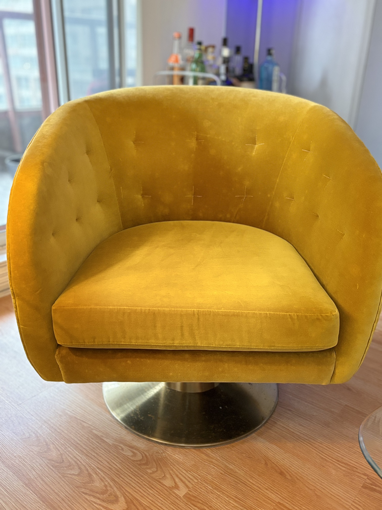 Swivel bucket chair - purchased @indigo