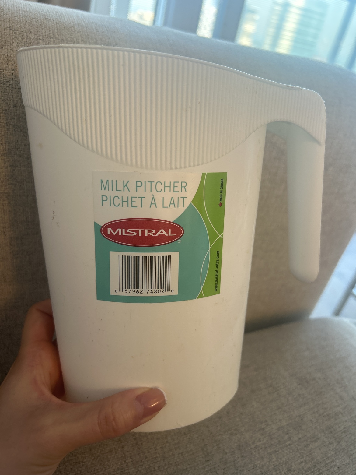 White plastic milk pitcher