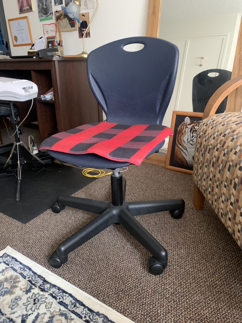 small blue plastic desk chair