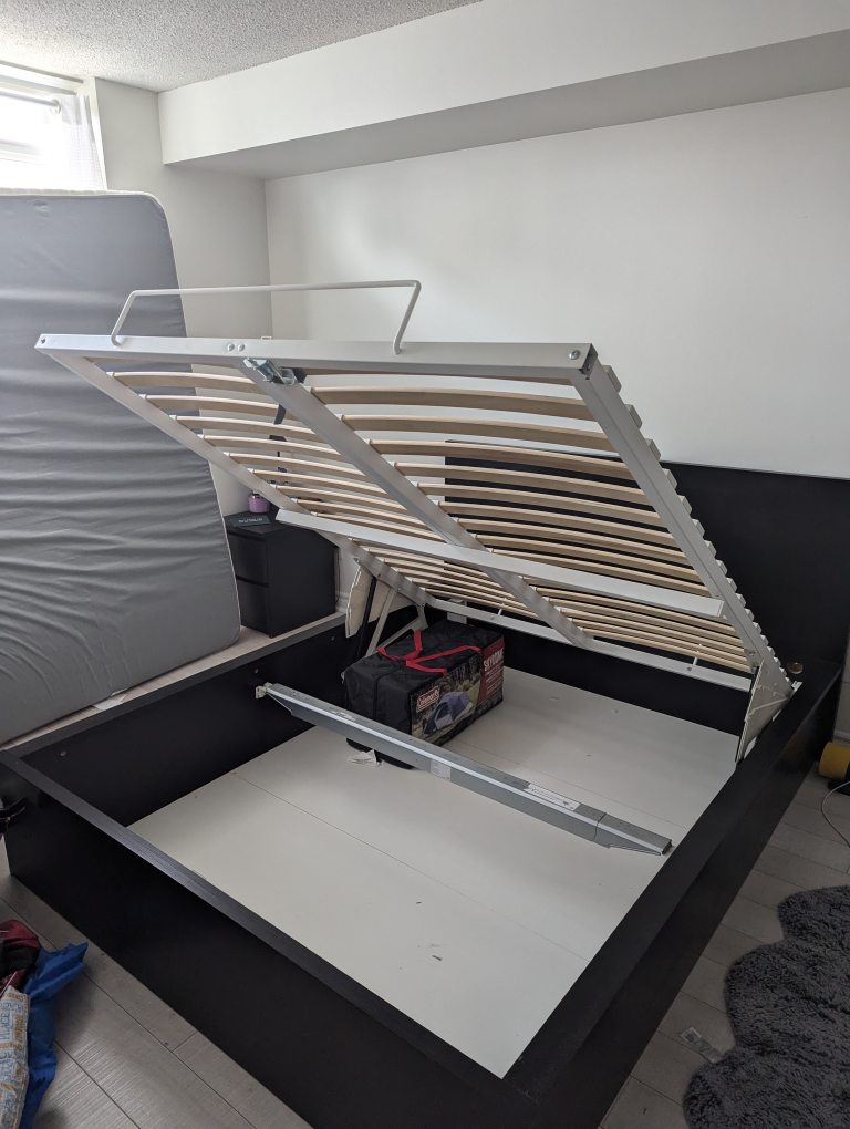 IKEA hydraulic lift-up queen bed with storage - photo 4
