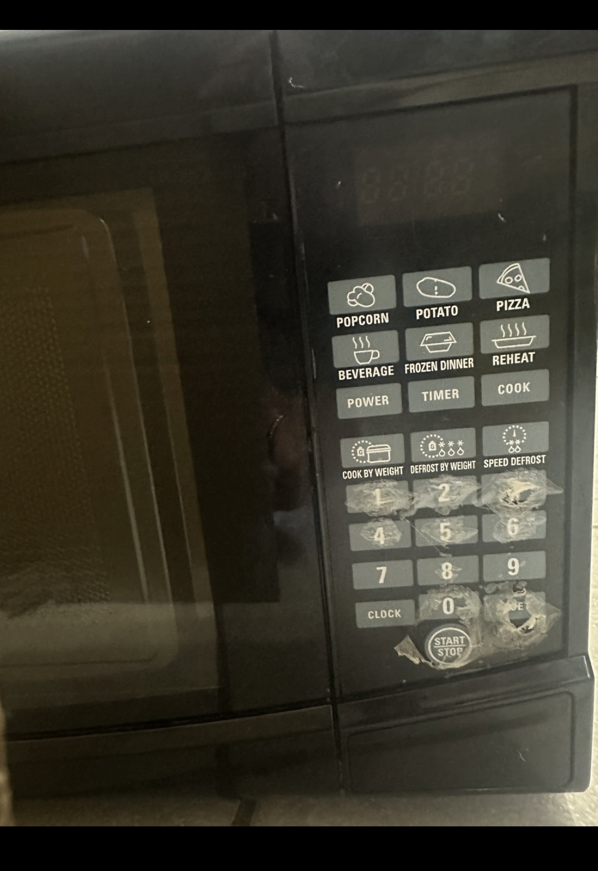 RCA 0.7 cu. ft. Countertop Microwave in Black - photo 5