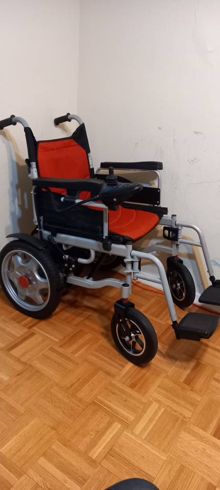 Electric wheel chair - photo 2
