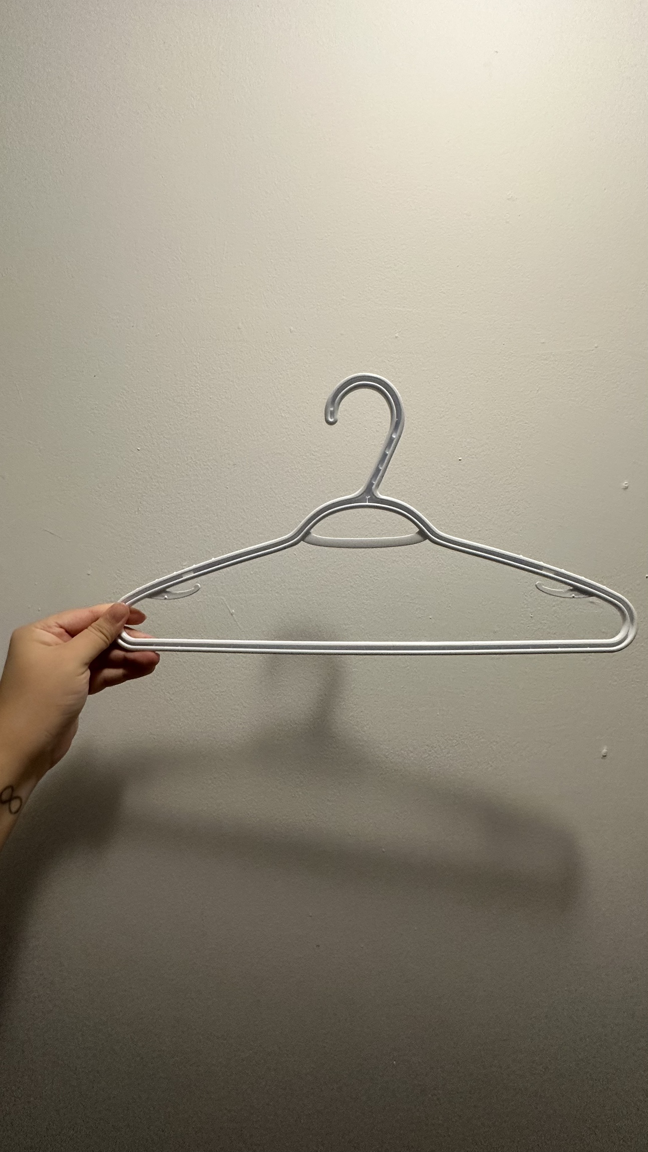 White Plastic Hangers - photo 2