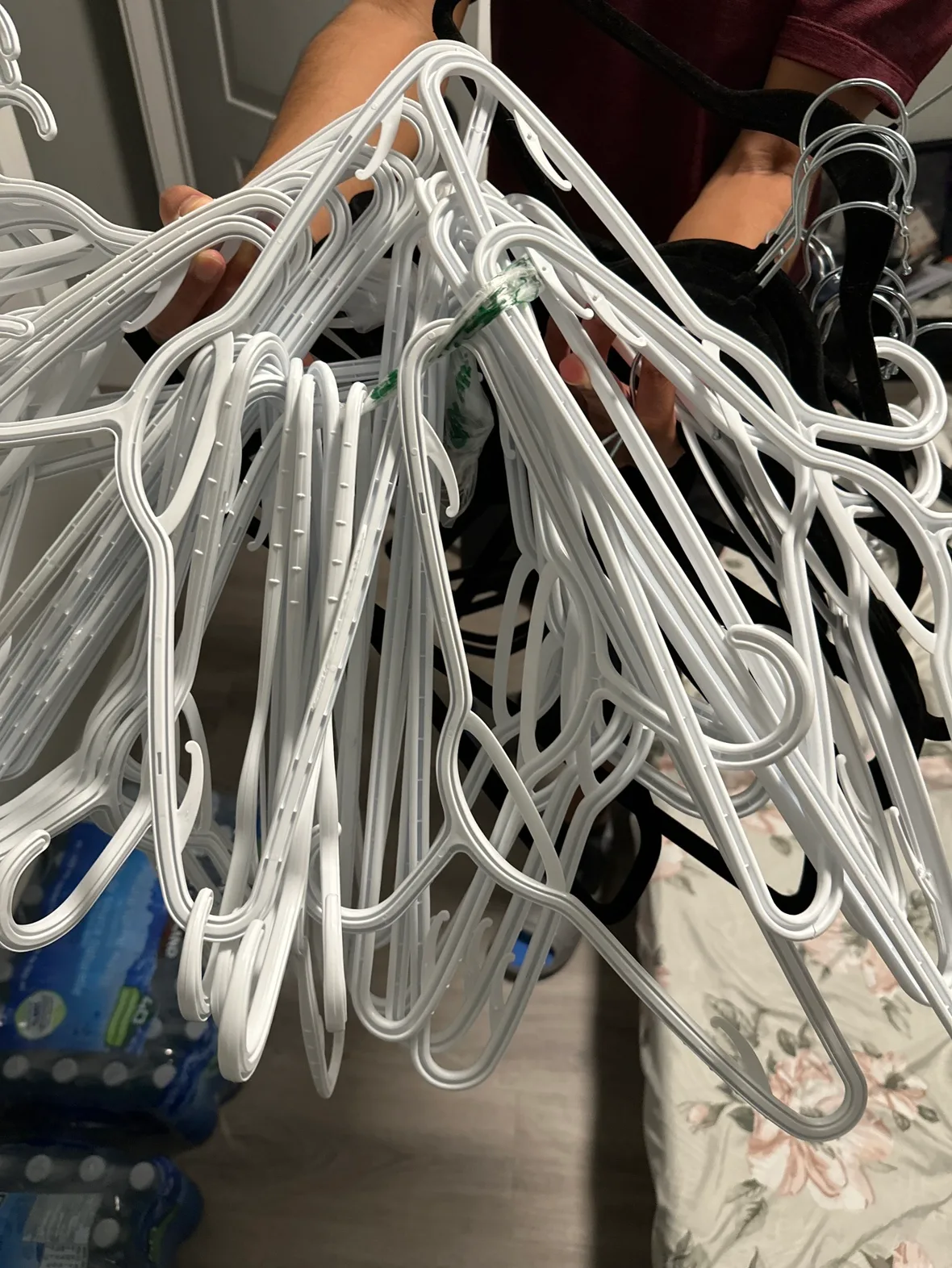 White Plastic and Black Non Slip Hangers thumbnail