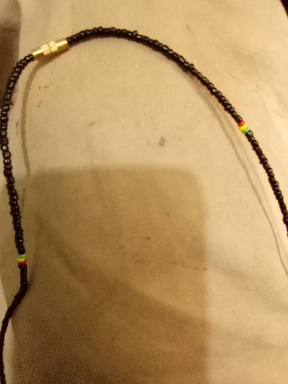 Black beaded necklace with pendant image indicator(2)