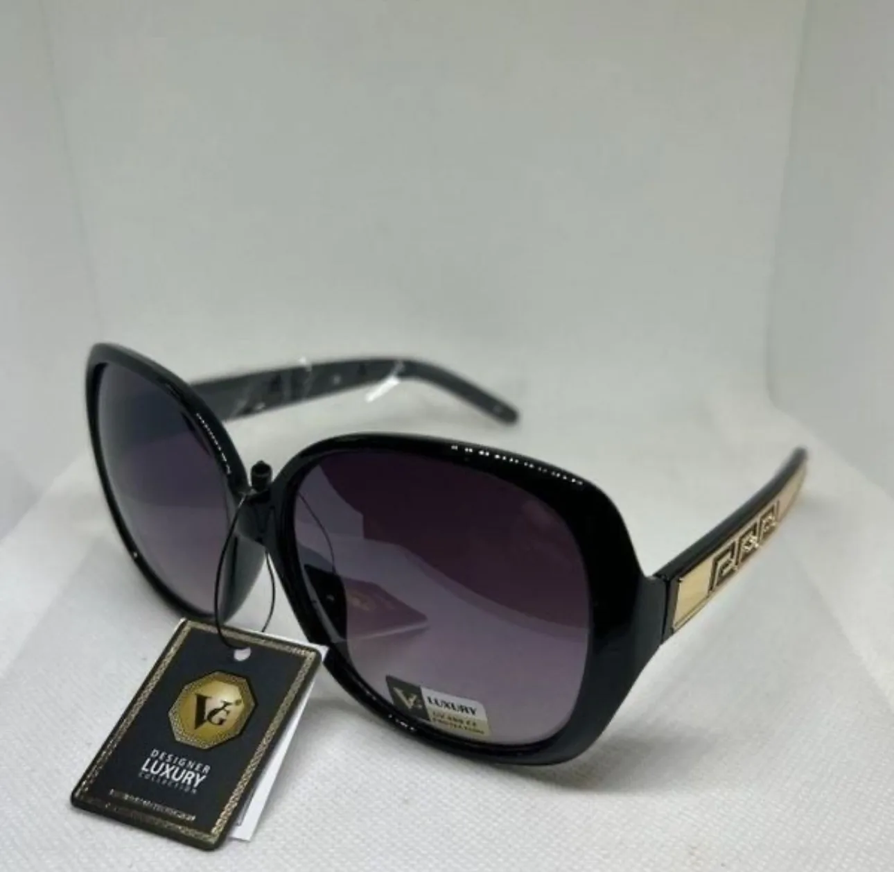 Black Sunglasses with Gold Detail image indicator(3)