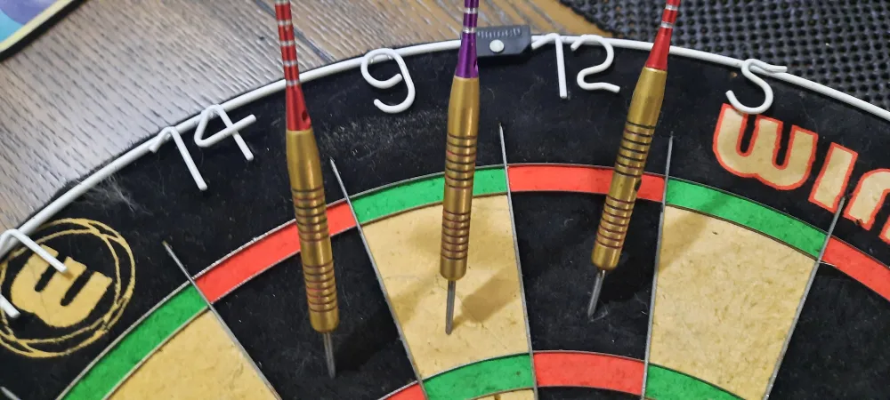 2 Dart sets from The Pool shoppe and Winmau Blade 5 Dartboard image indicator(2)