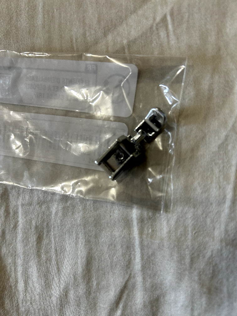 zipper foot and rolled  hem foot