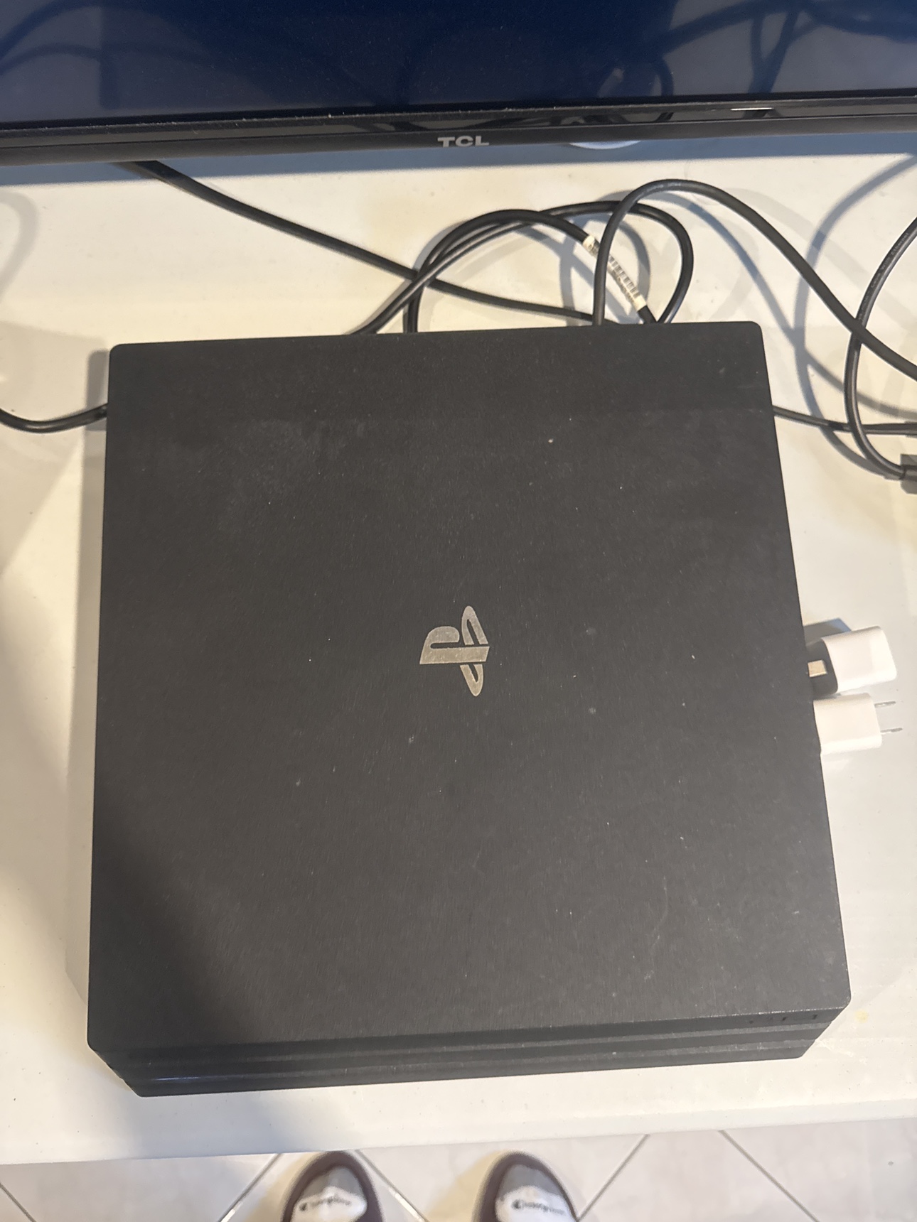 PlayStation 4 Pro Console with a controller