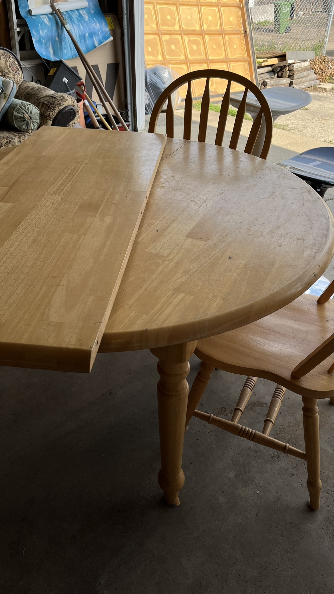 Round Extending Dining Table with Four Chairs