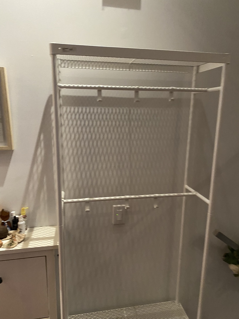 White IKEA coat and shoe rack