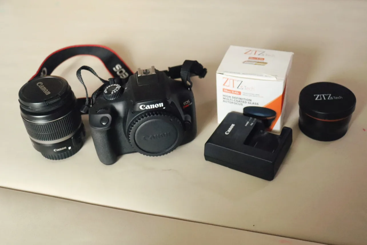 Canon EOS Rebel t100(4000d) dslr camera + lens thumbnail