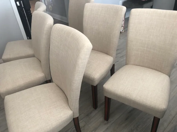 Six Beige Upholstered Dining Chairs image indicator(4)