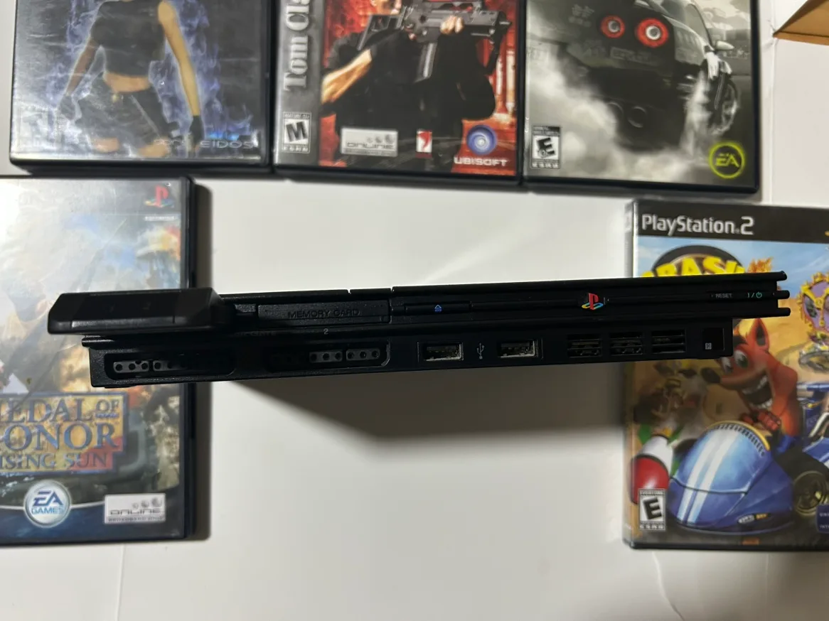 Sony PS2 slim Console with 5 games image indicator(3)