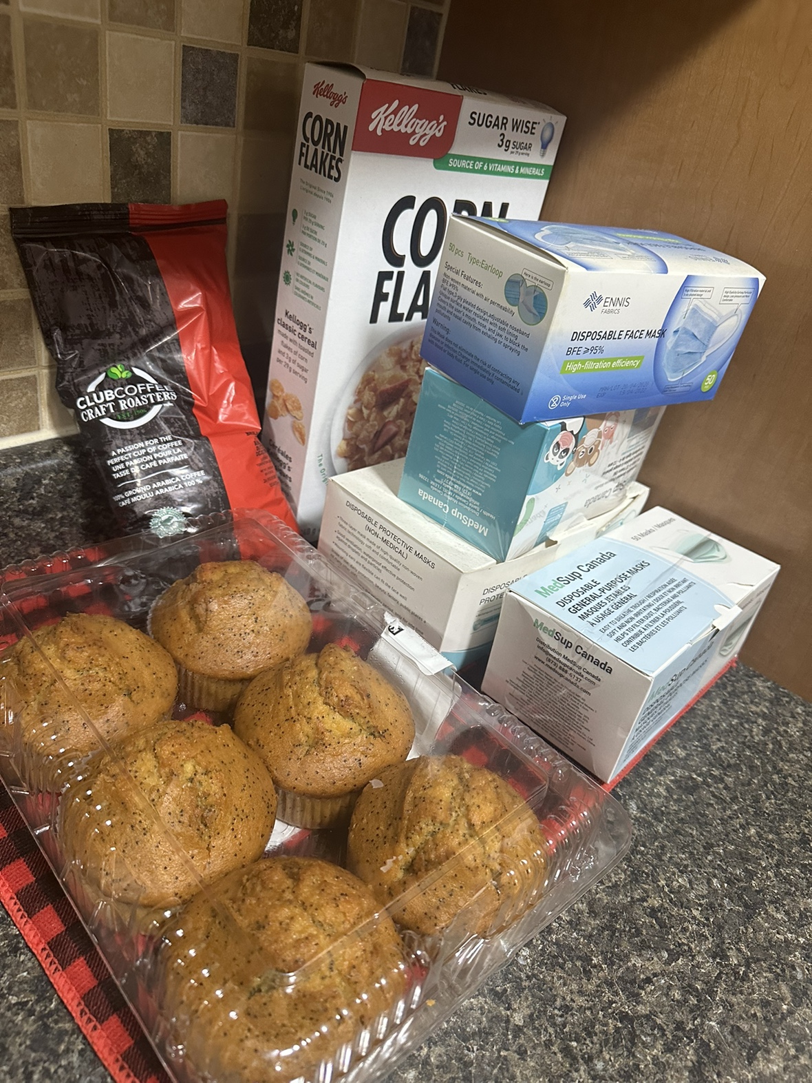 Muffins in Container, face mask and cereal