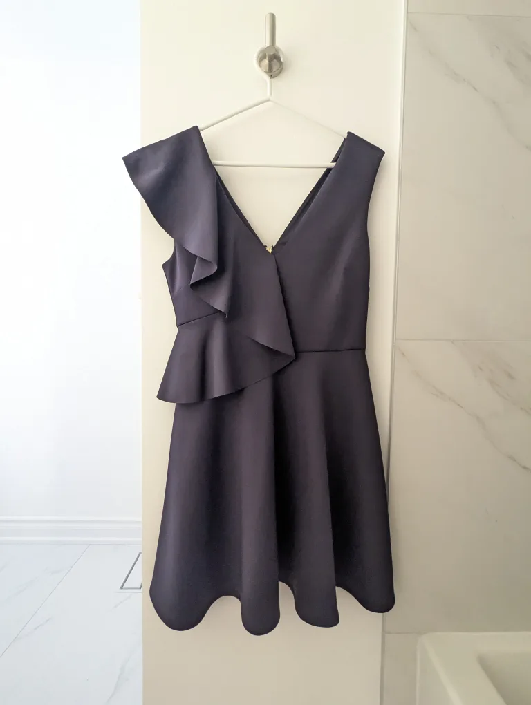 Navy blue sleeveless dress with ruffle thumbnail