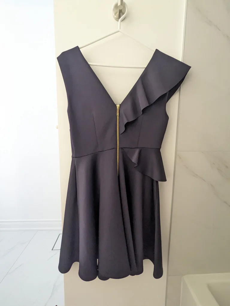 Navy blue sleeveless dress with ruffle image indicator(2)