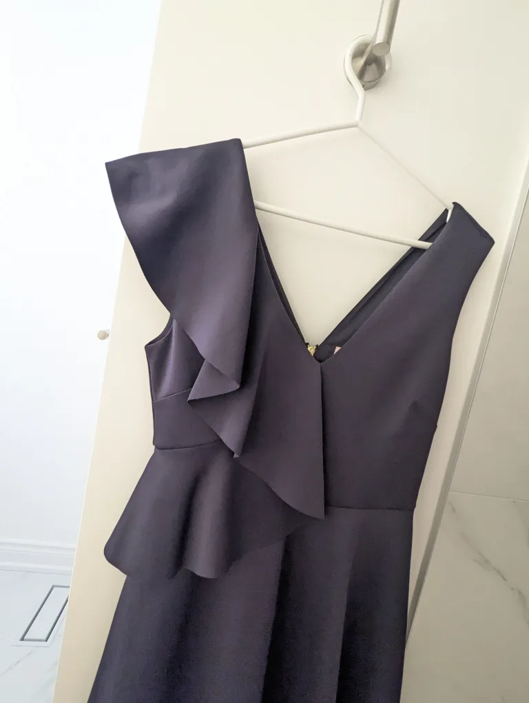 Navy blue sleeveless dress with ruffle image indicator(3)