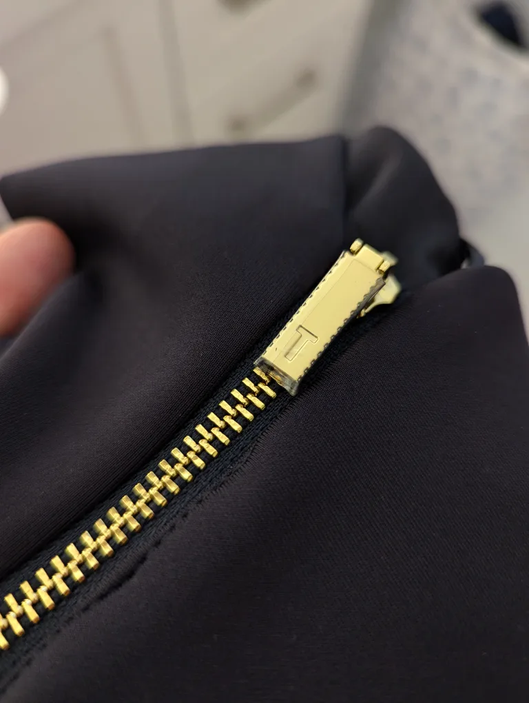 Navy blue sleeveless dress with ruffle image indicator(5)