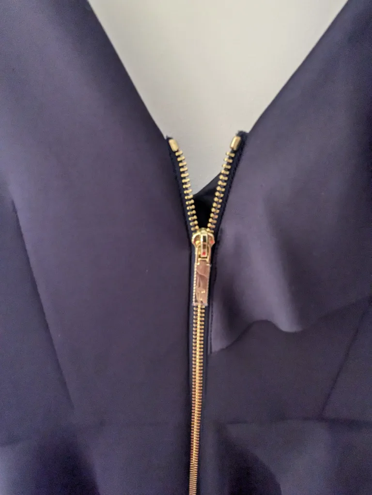 Navy blue sleeveless dress with ruffle image indicator(6)