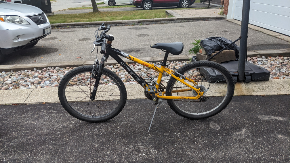Yellow and Black Miele Mountain Bike. 24" wheels