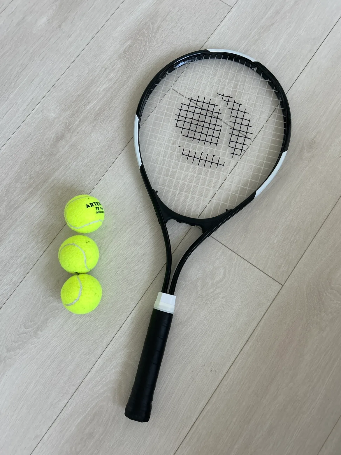 Tennis racket and balls thumbnail