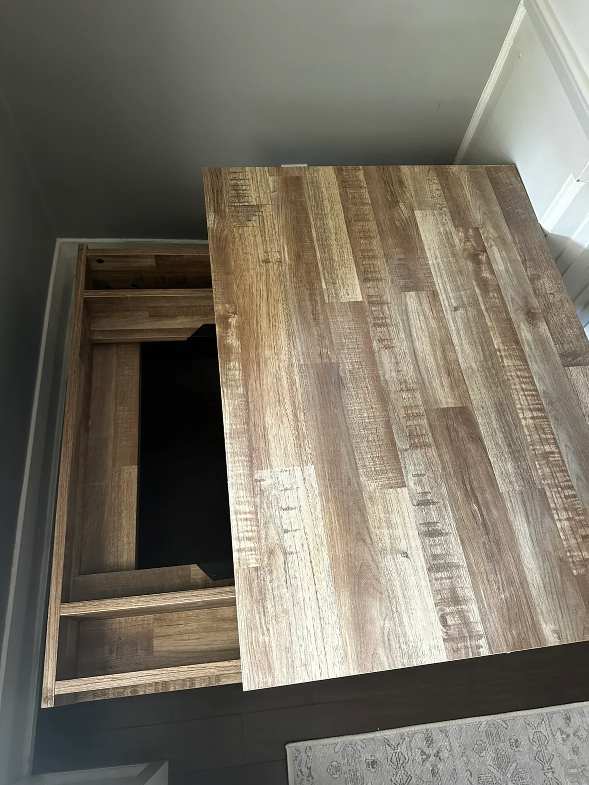 Signature Design by Ashley - Gerdinet Lift Top Coffee Table image indicator(6)