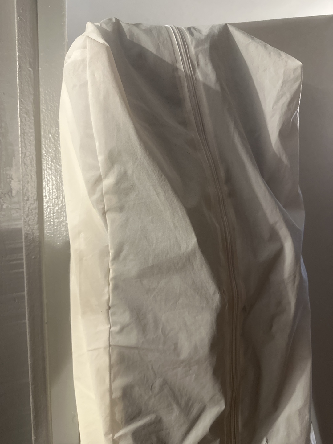 White Garment Bag with full-size mattress