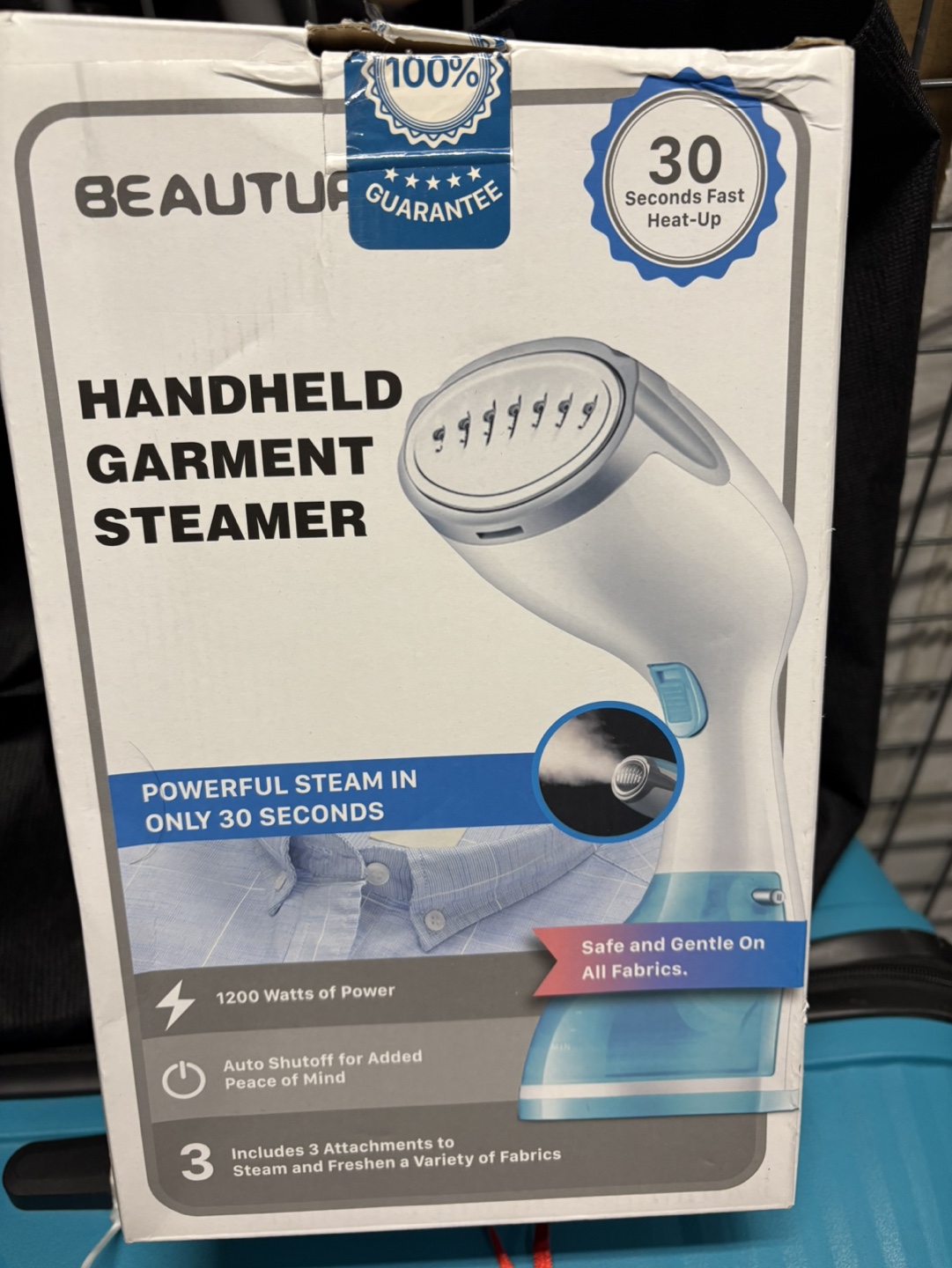 Handheld garment steamer